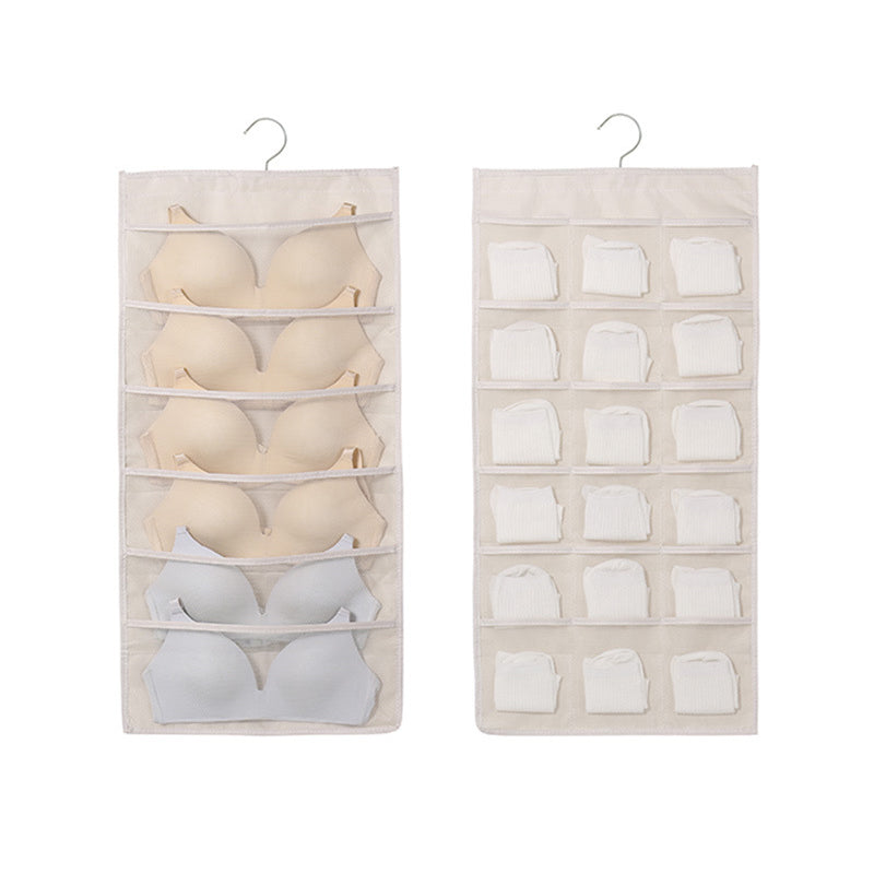 Close-up of mesh pockets on the hanging closet organizer, showcasing material quality.