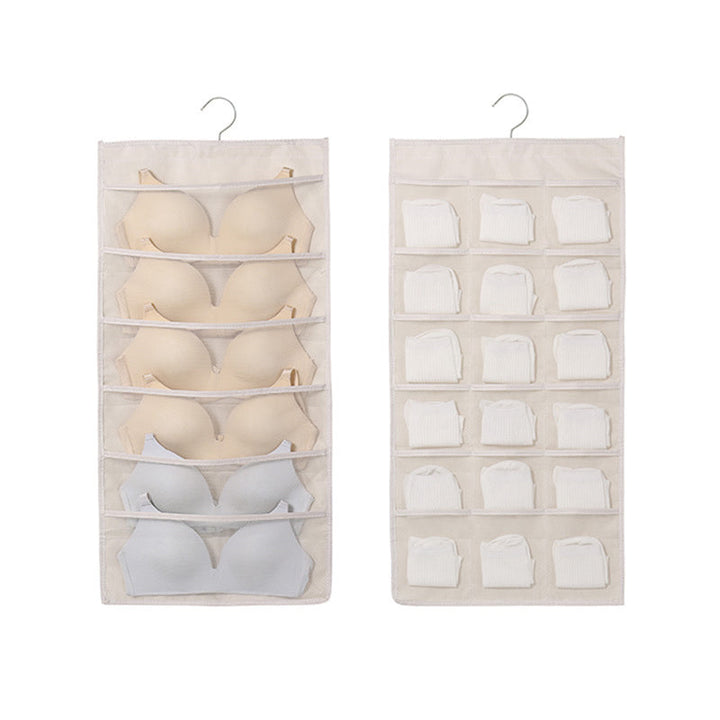 Close-up of mesh pockets on the hanging closet organizer, showcasing material quality.