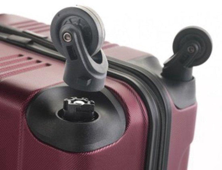 Medium hardshell travel bag, balancing storage with easy-to-maneuver and silent spinner wheels.