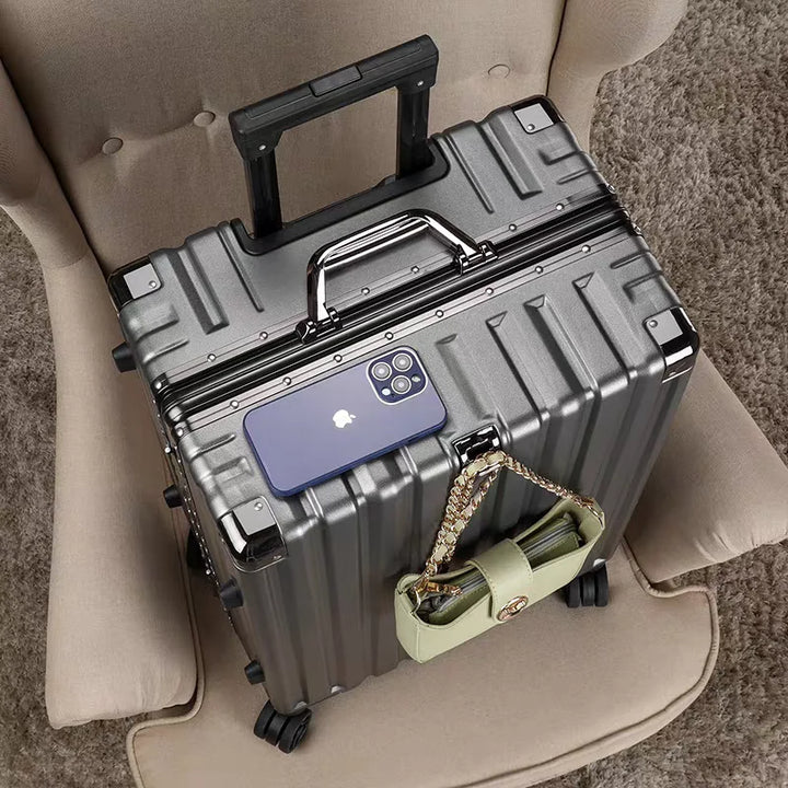 Premium checked luggage with a durable secure frame, smooth spinner wheels, ensuring secure vacation travel.