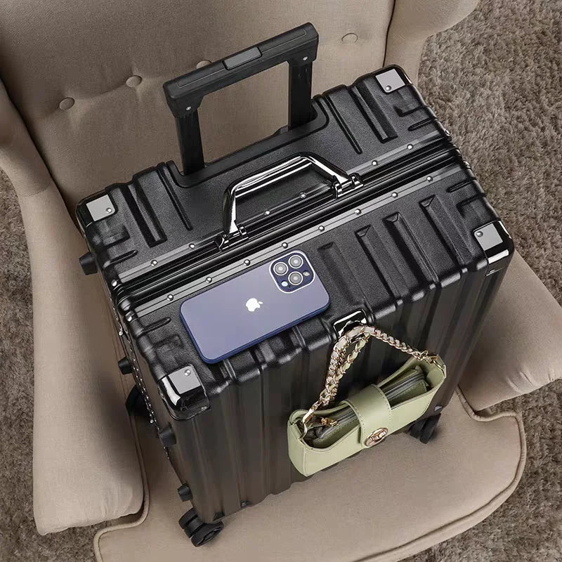 Compact carry-on suitcase featuring a secure frame & responsive spinner wheels for efficient travel.