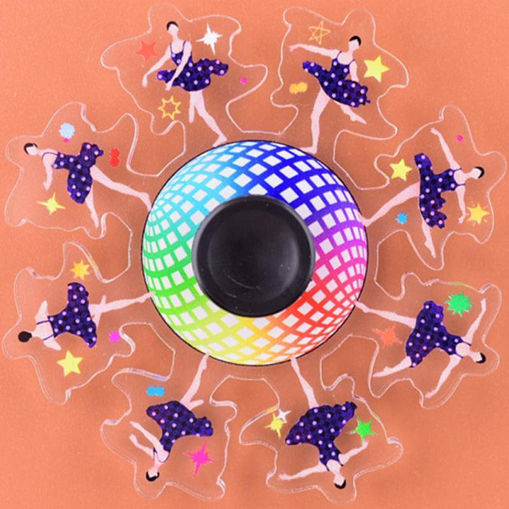 Person's hand actively spinning a Dynamic Animated Fidget Spinner, demonstrating its smooth gyro action.