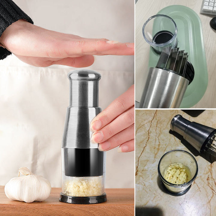 Stainless steel garlic press next to chopped garlic, kitchen essential