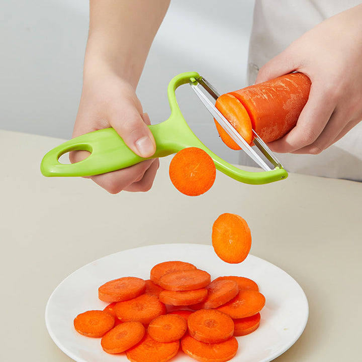 Stainless steel peeler for effortless fruit and vegetable skin removal, essential kitchen tool