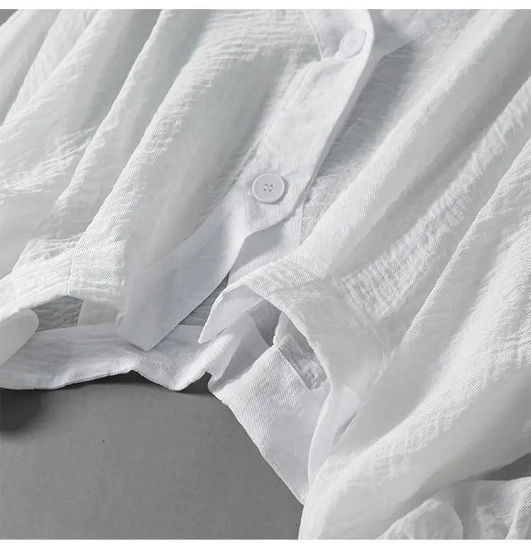 Casual women's summer top, a relaxed fit blouse in white, perfect for everyday elegance and warm weather fashion.
