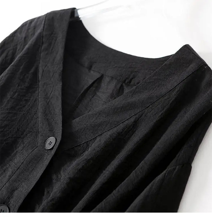 Black relaxed fit summer blouse for women, a lightweight and casual top with subtle button detail for everyday wear.