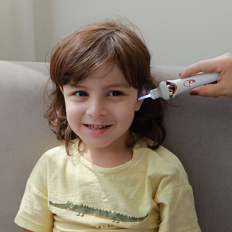 Detailed view of the ergonomic design of the electric ear wax remover for comfortable handling & use.