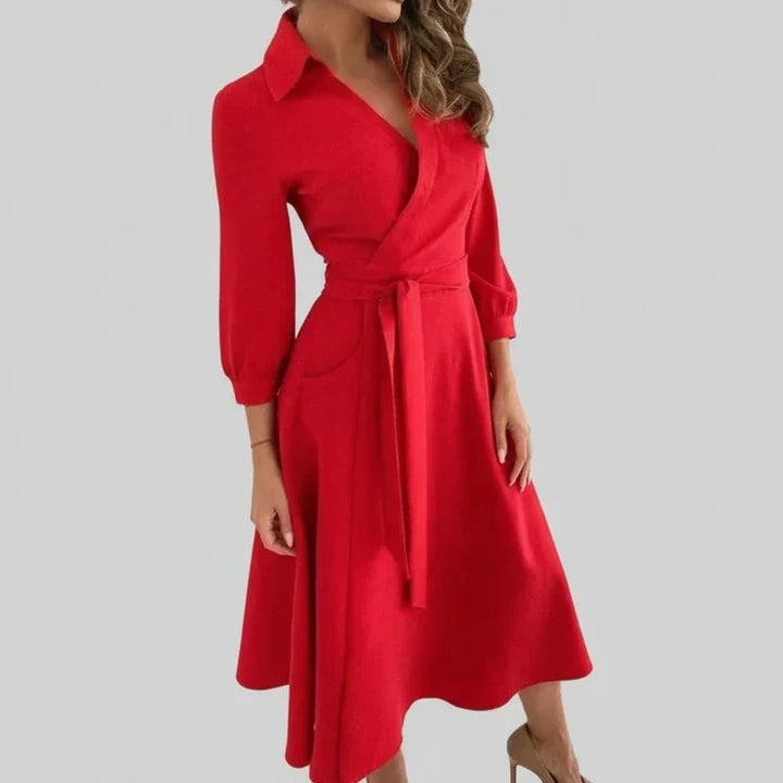Elegant A-line midi dress with belt & V-neck for women. Versatile spring/summer fashion.