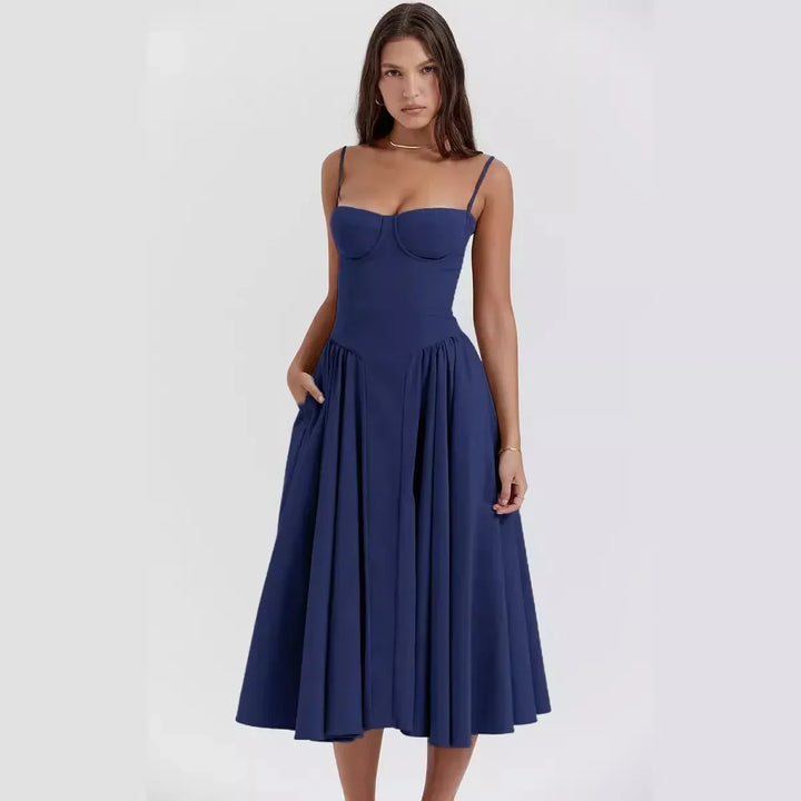 Women's elegant party dress, a midi length evening gown with a stylish pleated skirt.