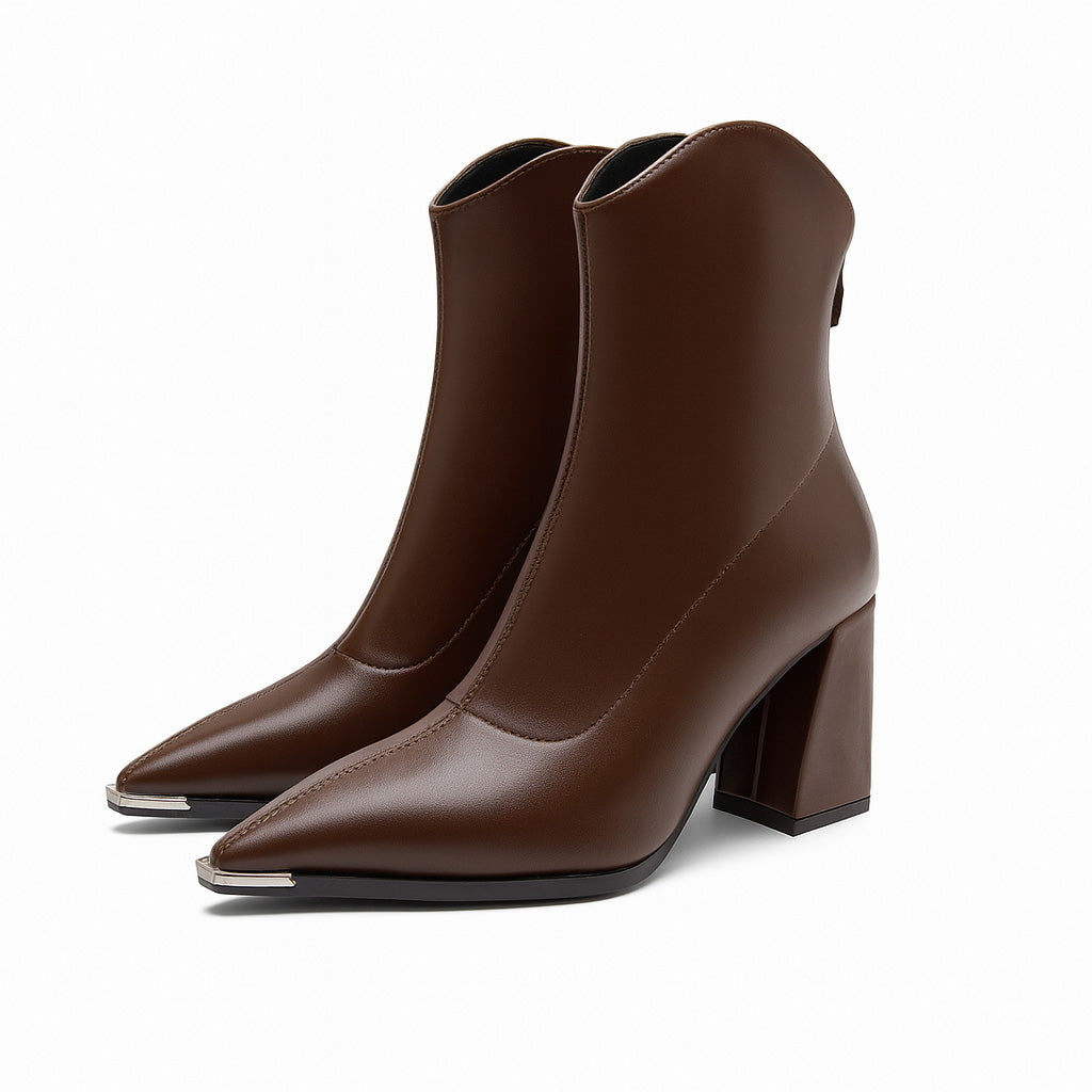Elegant black ankle boots for women, pointed toe, block heel design, perfect for spring fashion.