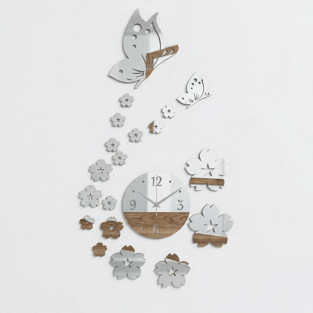 Modern black butterfly wall clock. Elegant floral details & quartz movement make a statement in nature-inspired decor.