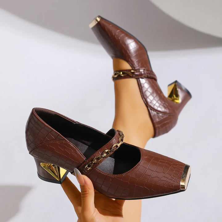 Brown faux leather block heel sandals, women's dress shoes with a unique chain detail and squared toe.