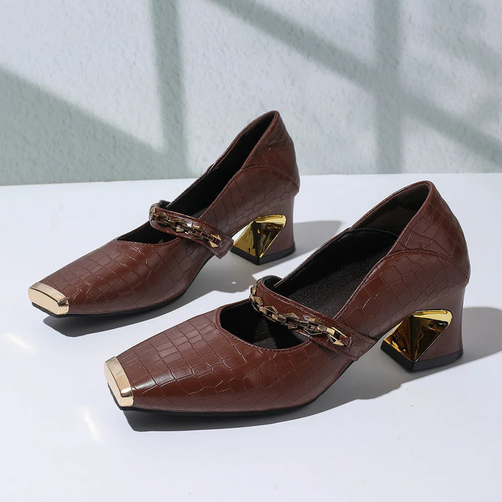 Stylish women's evening block heel sandals in faux leather, offering both elegance and comfort.