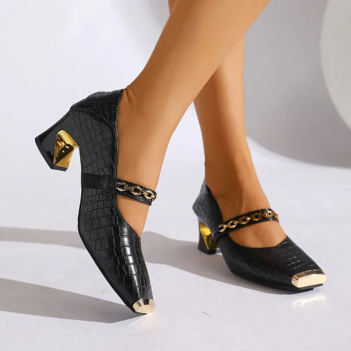 Side view of women's dressy block heel sandals, showing the comfortable heel and stylish faux leather.
