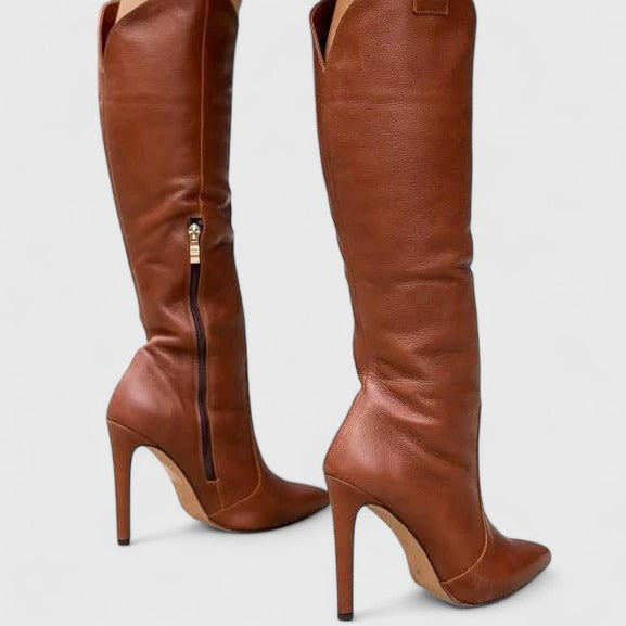 Fashionable pointed toe knee high boots for women, available in various leather & suede finishes