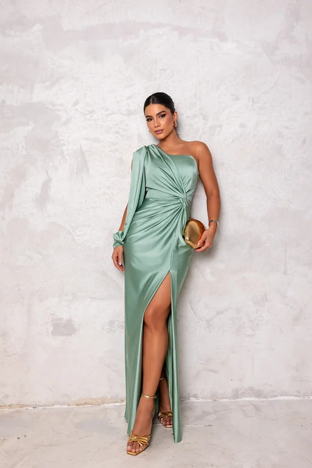 Emerald green one-shoulder ruched wedding guest dress, elegant and flattering for women.