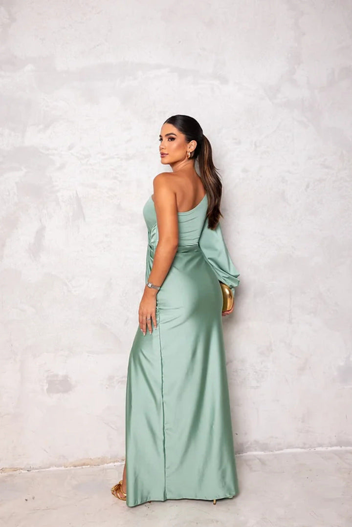 Blush pink one-shoulder ruched maxi evening gown, ideal for formal events and parties.