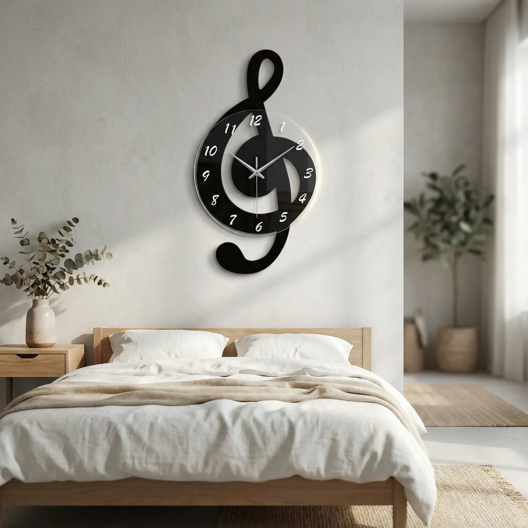 Elegant black treble clef musical wall clock. Perfect decorative accent for music lovers' home decor.