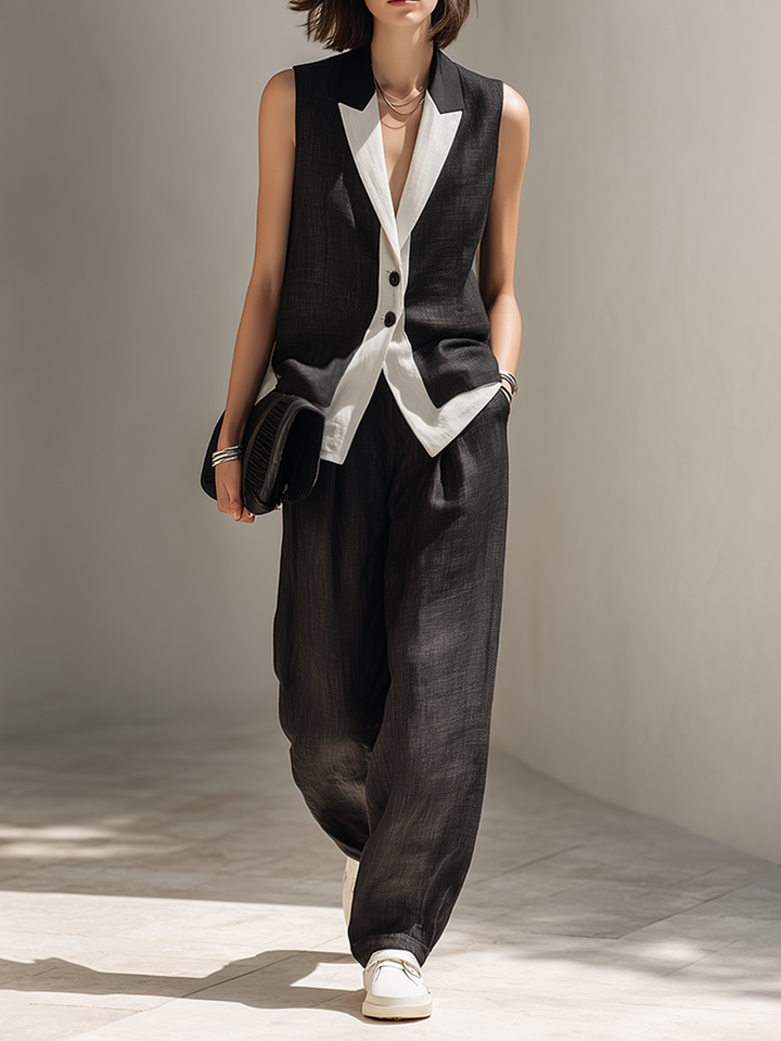 Elegant black women's two-piece set with a tailored vest top & stylish wide-leg pants, perfect for office or evening.