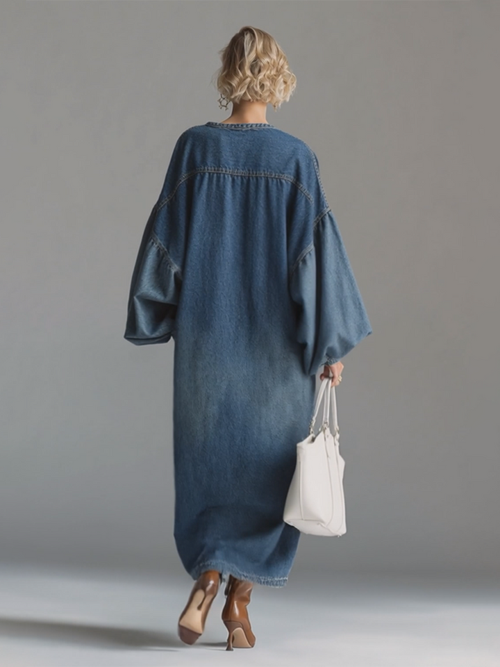 Modest yet elegant blue button-down maxi dress, a versatile wardrobe essential for casual or evening wear.