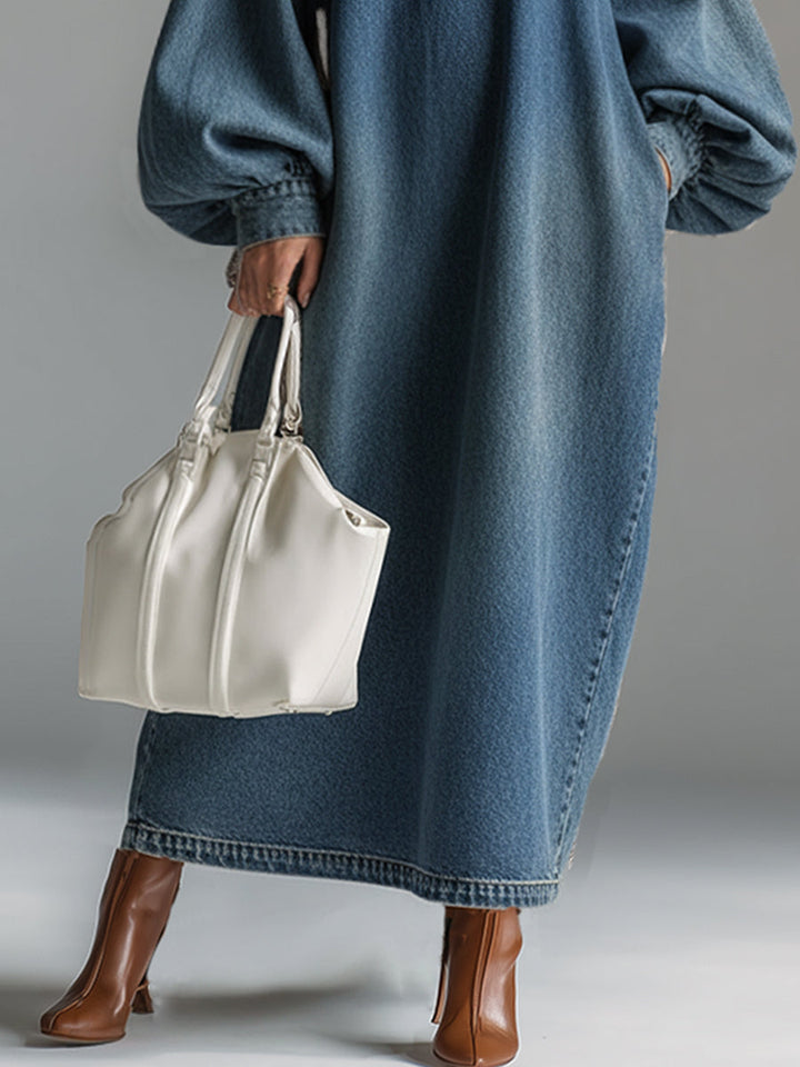 Chic women's blue maxi dress with button-down front, embodying urban elegance for modern casual style.