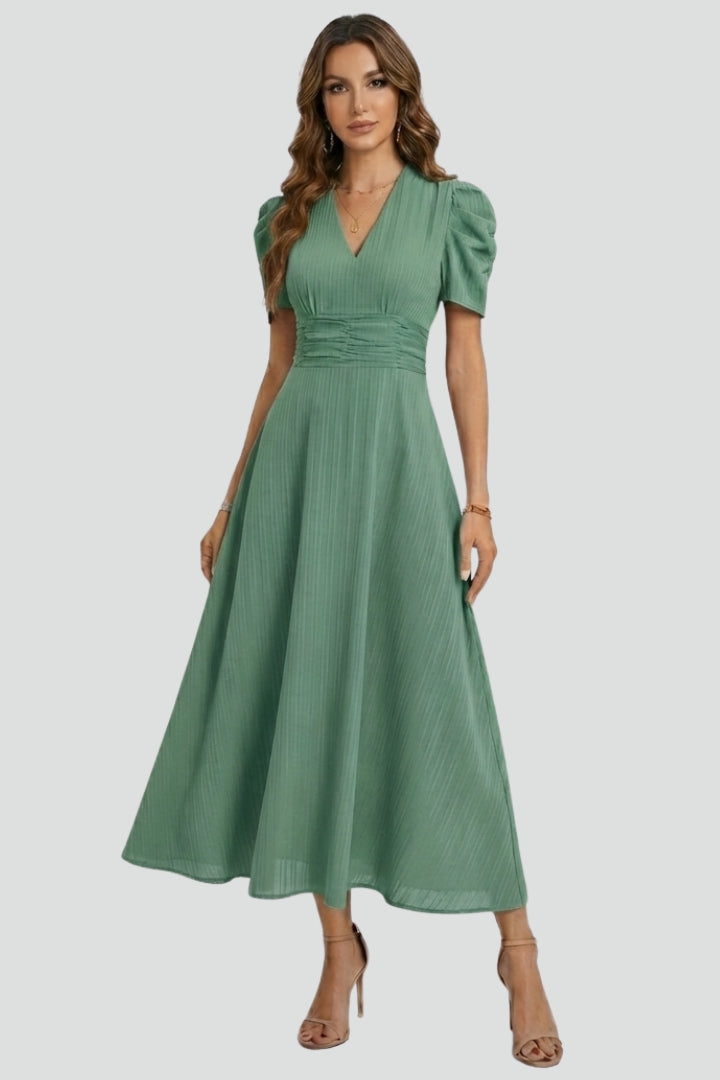 Chic short sleeve V-neck midi dress for women, ideal for casual to formal events, with a flattering ruched waist.