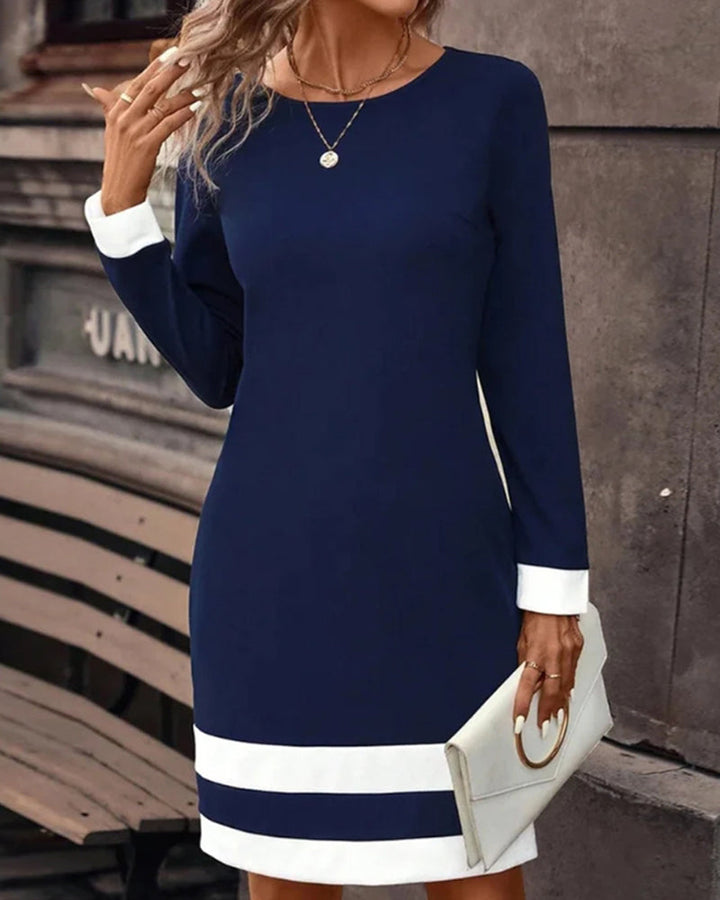 Versatile dark blue party dress for women, classic elegant style suitable for formal dinners & special events.