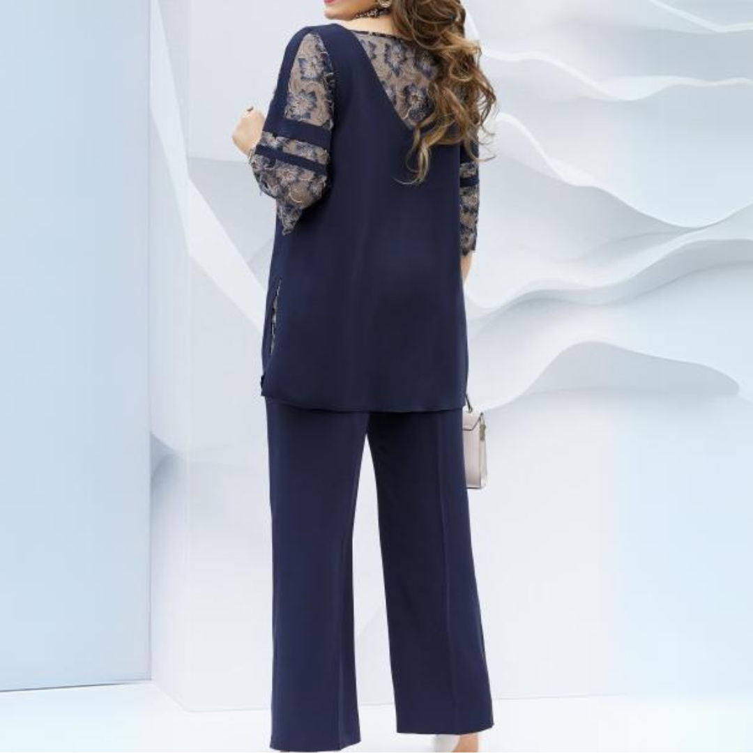 Model showcasing a comfortable & elegant dark blue women's two-piece set, ideal for spring & summer fashion.