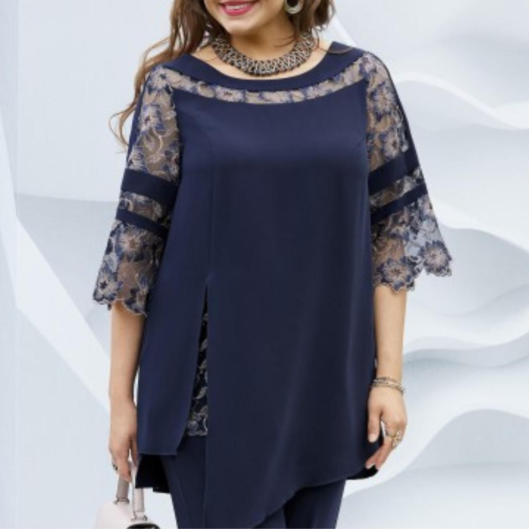Close-up of the fabric and detail of the dark blue women's two-piece set, highlighting its elegant design.