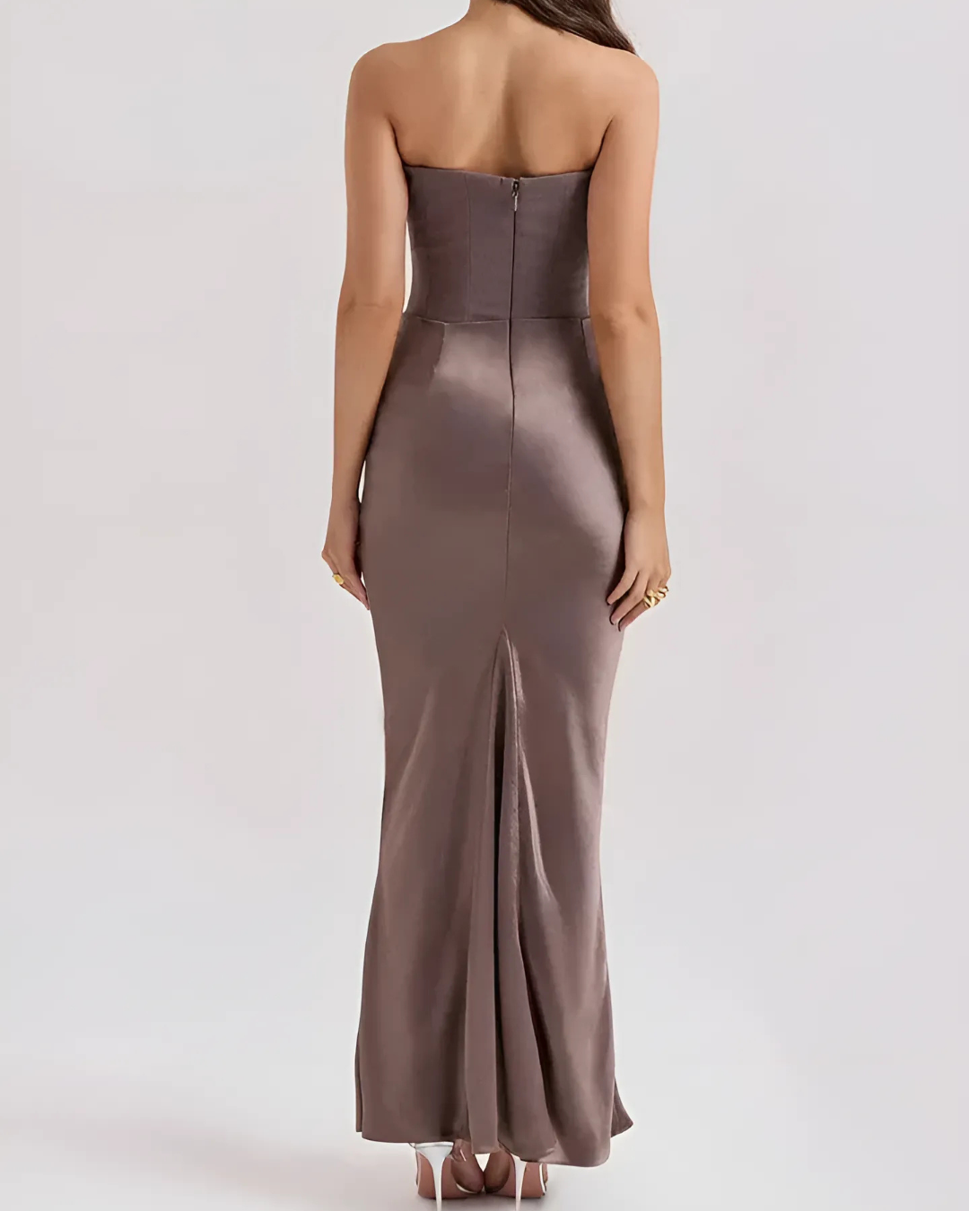 Women's formal maxi dress with draped detailing, ideal for evening wear and special occasions.