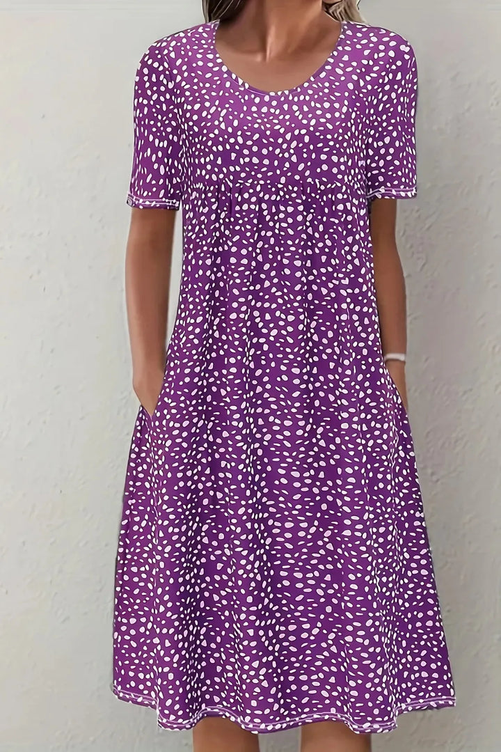 Stylish Ella women's dress with a flattering pleated waist, a sophisticated midi length perfect for events.
