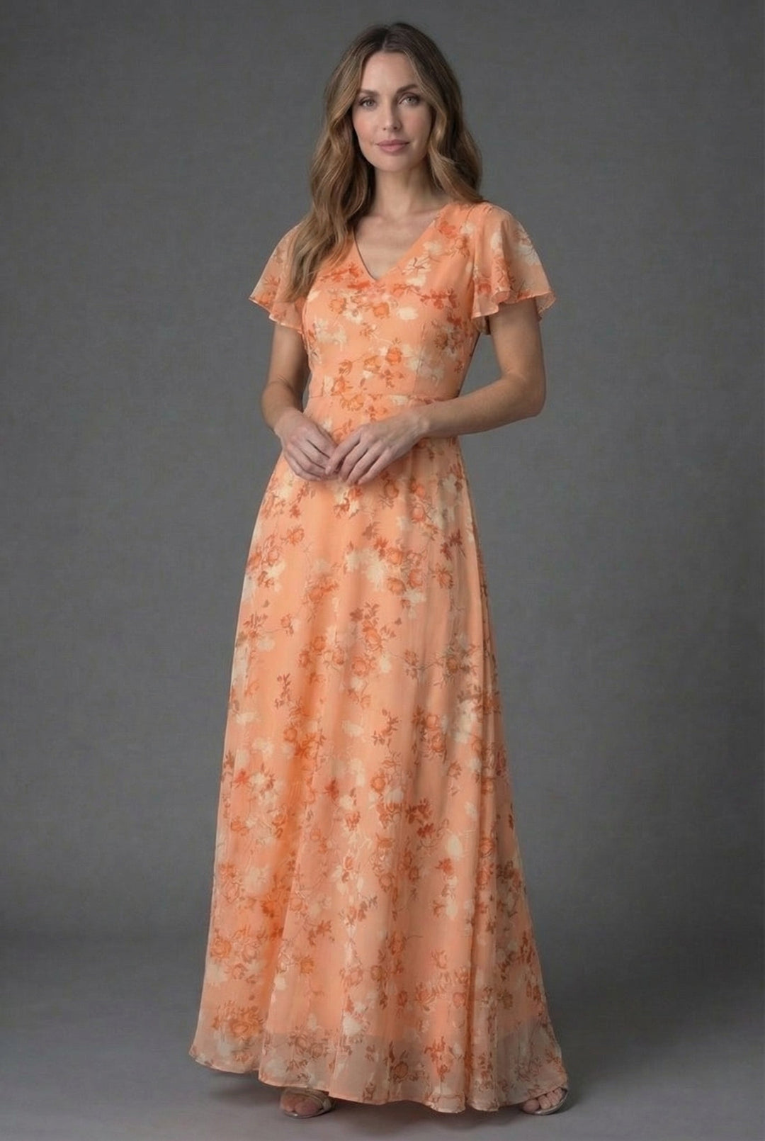 Elegant floral maxi dress with flutter sleeves & V-neck for wedding guests or summer parties. Women's fashion.