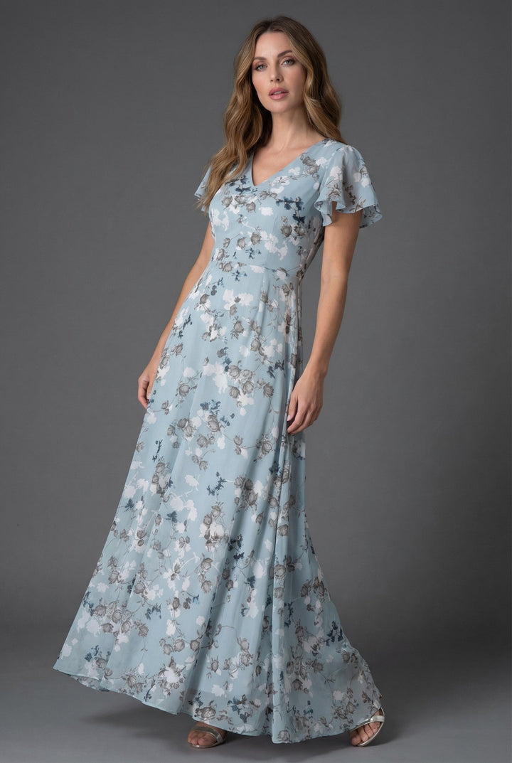 Chic floral maxi dress, V-neck, flutter sleeves. Ideal elegant women's dress for wedding guest or party wear.
