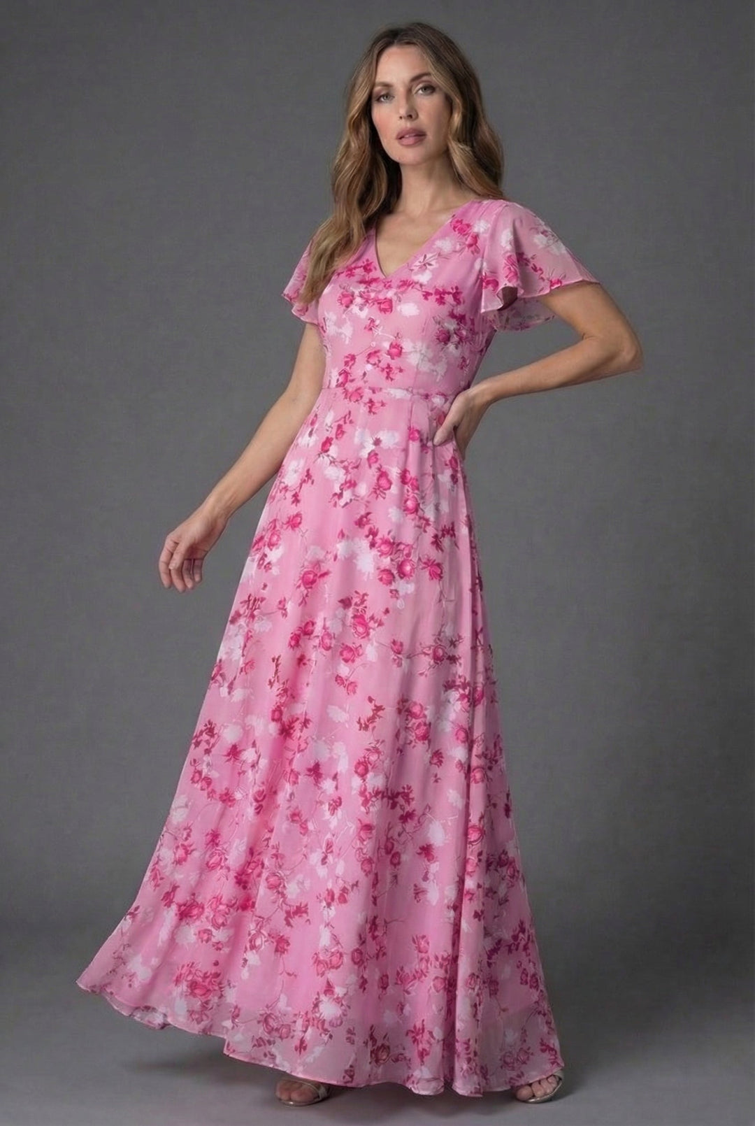 Comfortable elegant floral maxi dress with V-neck & flutter sleeves, perfect evening gown or occasion wear.