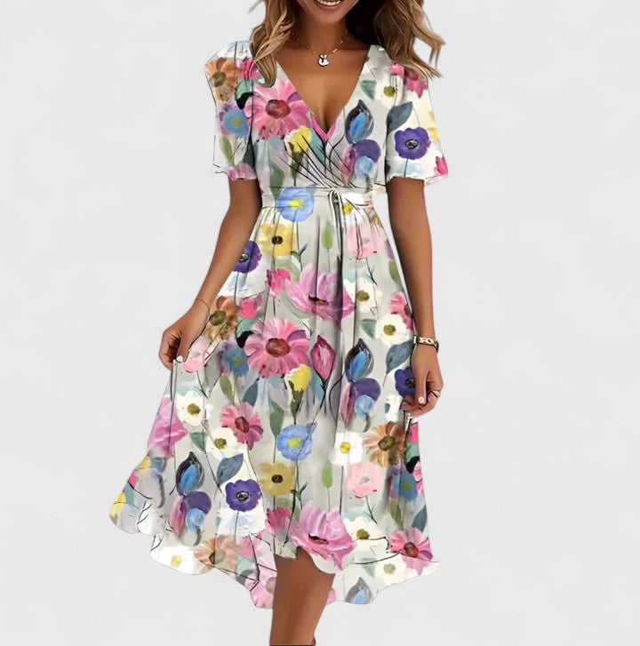 Stylish women's floral V-neck short dress, elegant flutter sleeves, and a flattering high-low hem.
