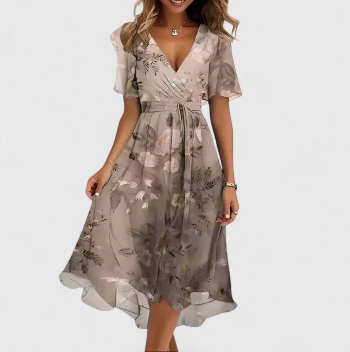 Elegant women's floral short dress featuring a V-neck, flutter sleeves, and flattering high-low hem.