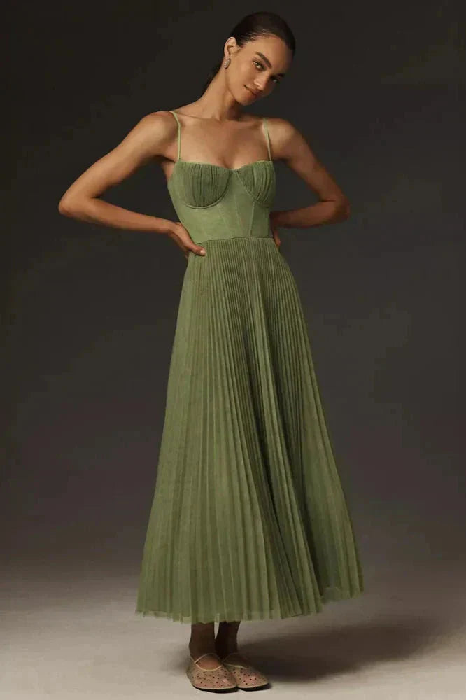Elegant green pleated maxi dress for women with delicate strappy detail, perfect for an occasion