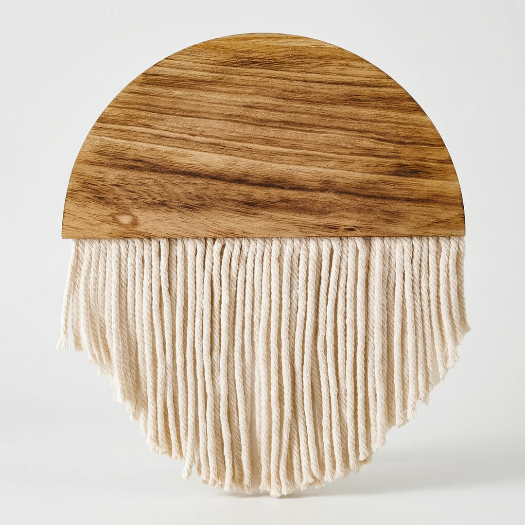 Textured semi-circular wall art featuring flowing waves and stylish fringe, an aesthetic home accent.