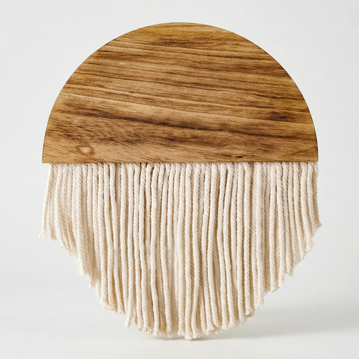 Textured semi-circular wall art featuring flowing waves and stylish fringe, an aesthetic home accent.