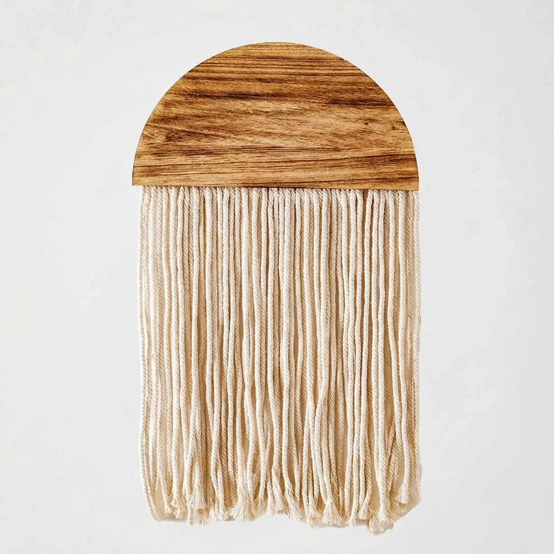Unique half circle wall decor with artistic fringe, bringing boho elegance to your living space.