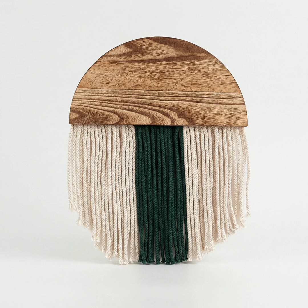 Modern semi-circular wall art with intricate fringe, a beautiful and minimalist home decor piece.