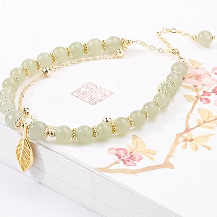 Beautiful Hetian jade gold leaf bracelet for women, a thoughtful anniversary or chakra gift option