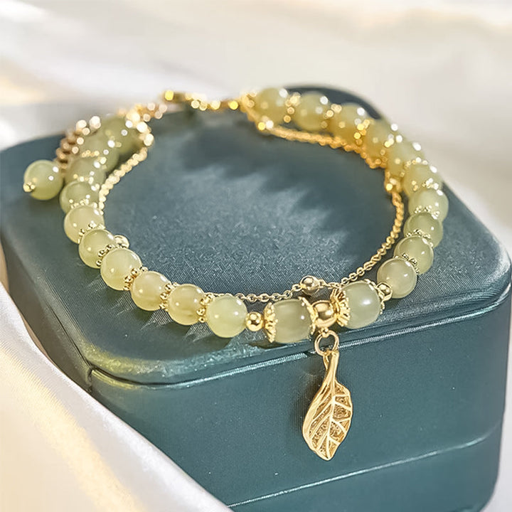 Gift-ready Hetian jade and gold leaf bracelet, an elegant and stylish piece for any woman