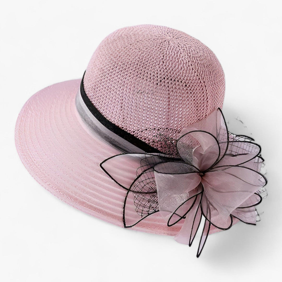 Fashionable Bellavue women's elegant sun hat with wide brim, a chic accessory for upscale summer occasions.