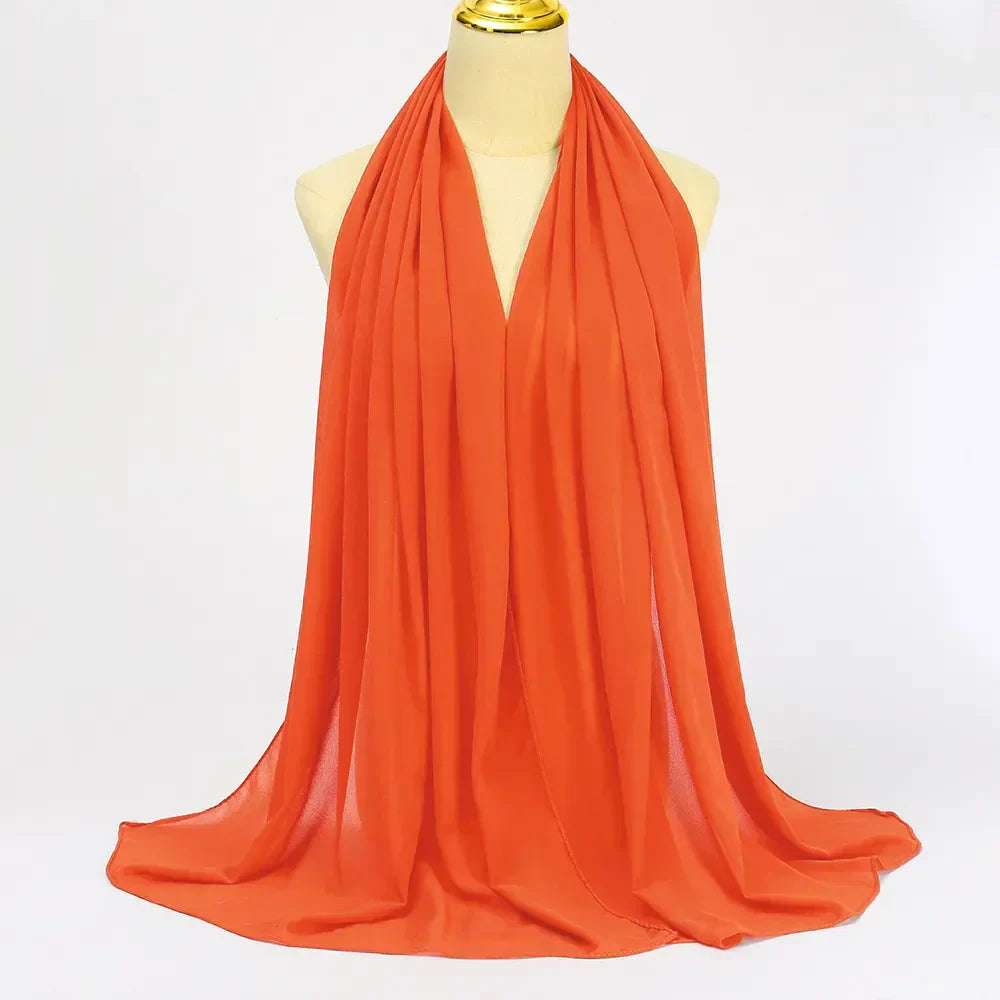 Green elegant chiffon hijab scarf, a versatile women's head covering and fashion wrap.