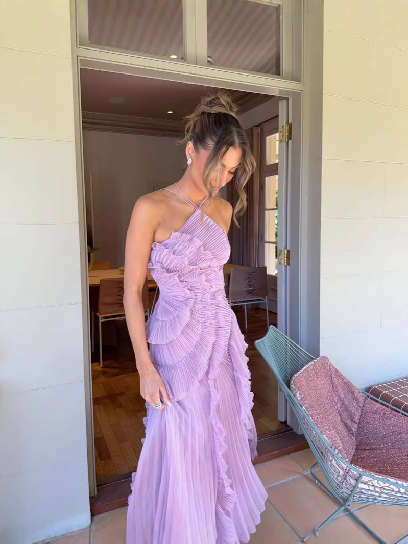 Chic sleeveless ruffled midi dress for women, featuring elegant ruffles & graceful lilac fabric.