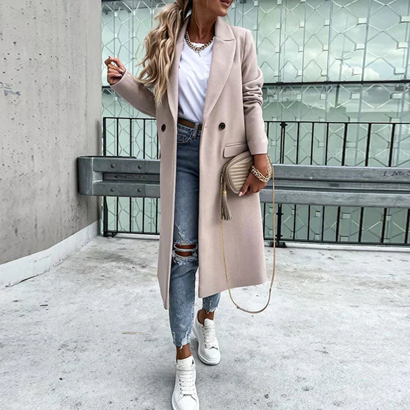 Stylish women's long coat, button-front design, elegant outerwear for cold season.