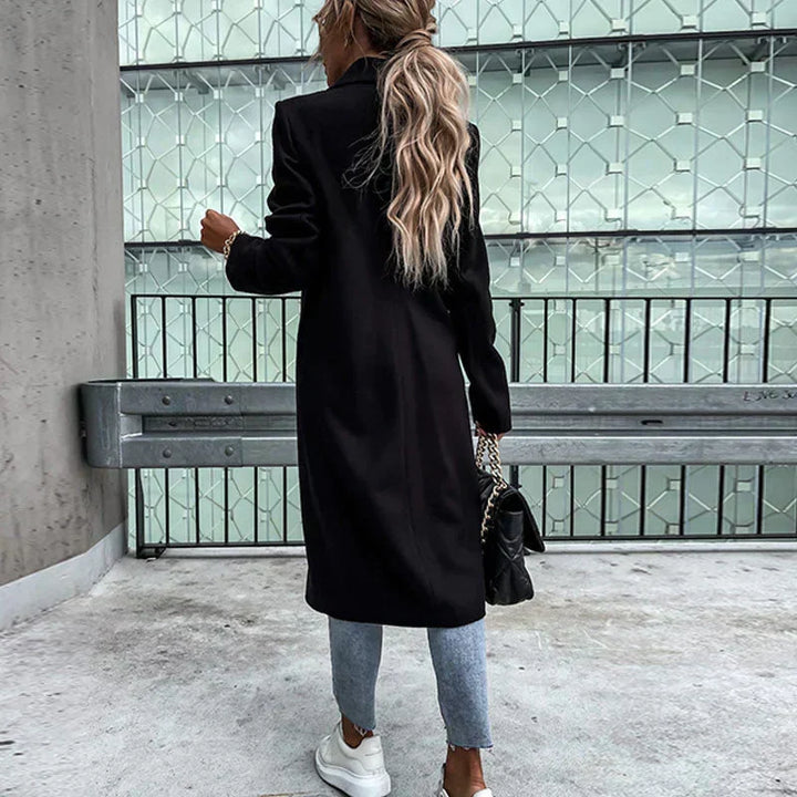 Women's long button-placket coat, elegant and stylish for winter fashion.