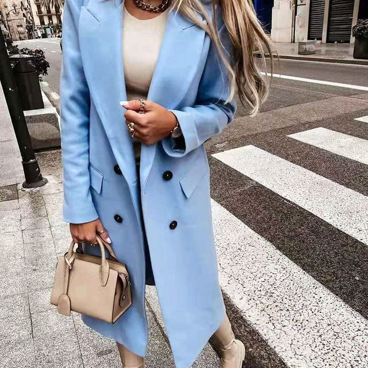 Classic women's elegant long coat, button design, perfect for cold weather.