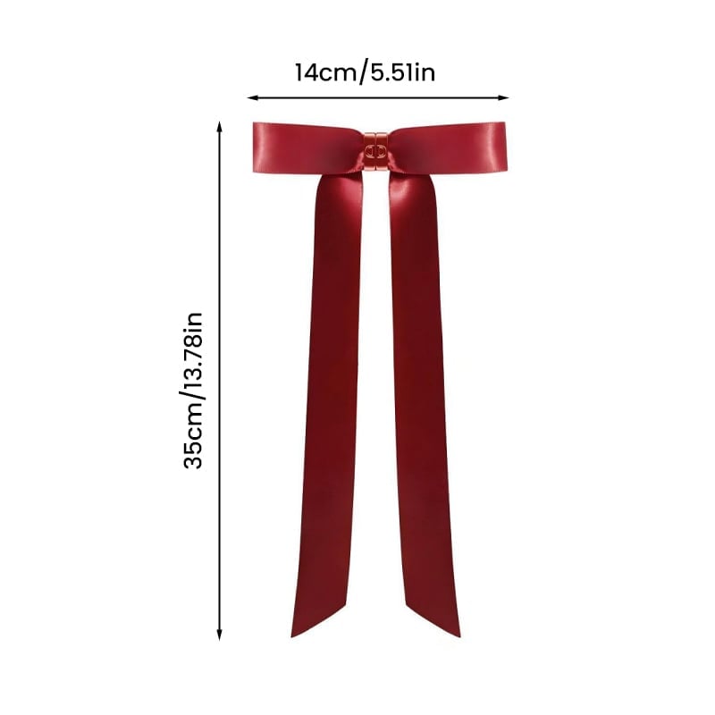 Magnetic bow hair clip on a white background, emphasizing its elegant shape and quick-style features.